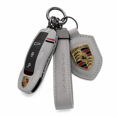 ნაცრისფერი Porsche-ს გასაღების ქეისის და ტყავის საკიდების ნაკრები
