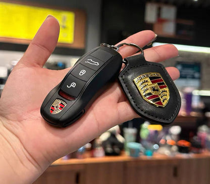 შავი მატი Porsche-ს გასაღების ქეისის და ტყავის საკიდების ნაკრები