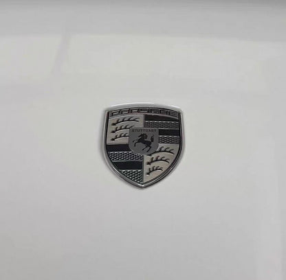 Engine cover emblem