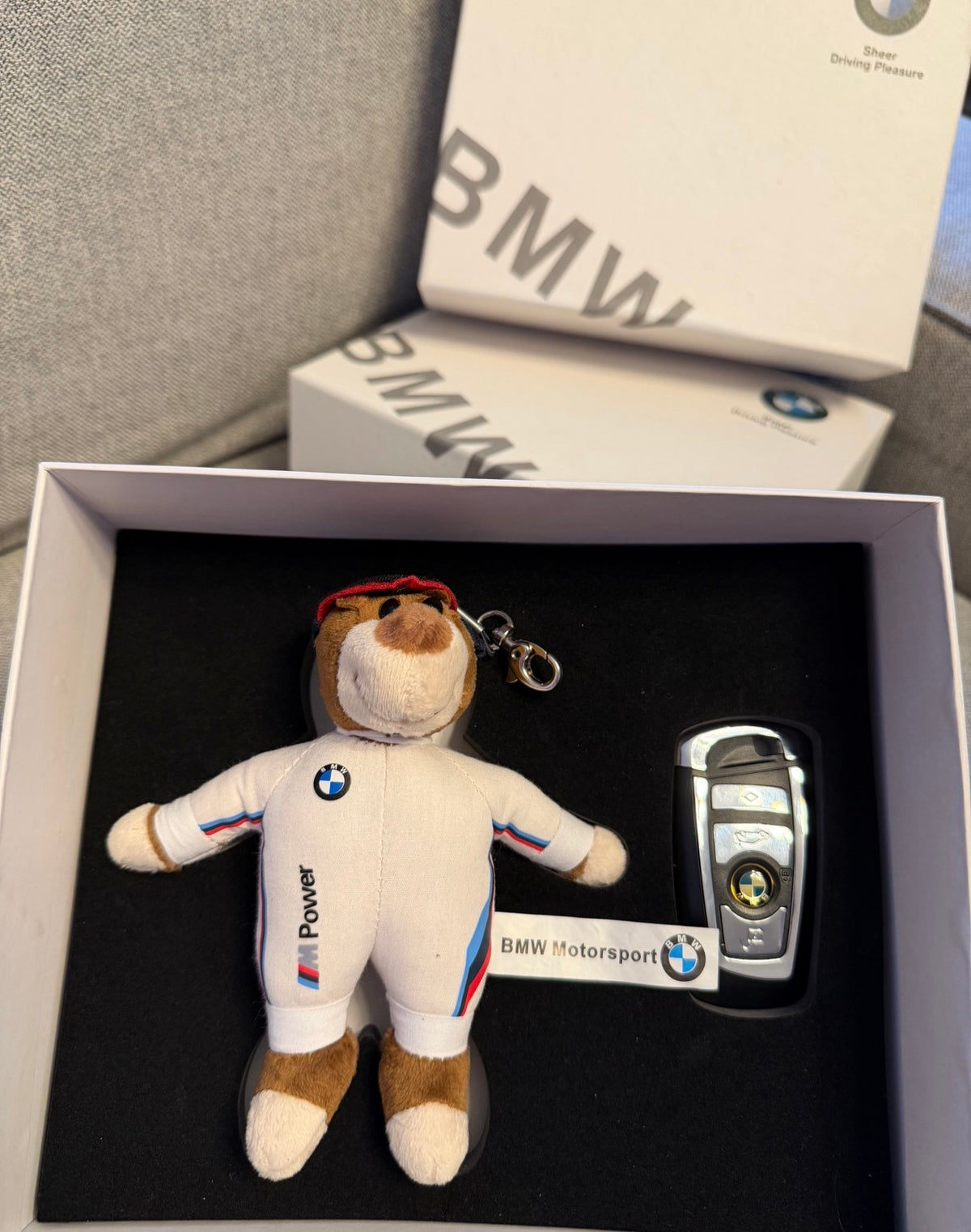 Gift box keychain BMW with a teddy bear and a memory chip
